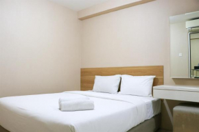 Cozy Living and Tidy 2BR Green Bay Pluit Apartment By Travelio